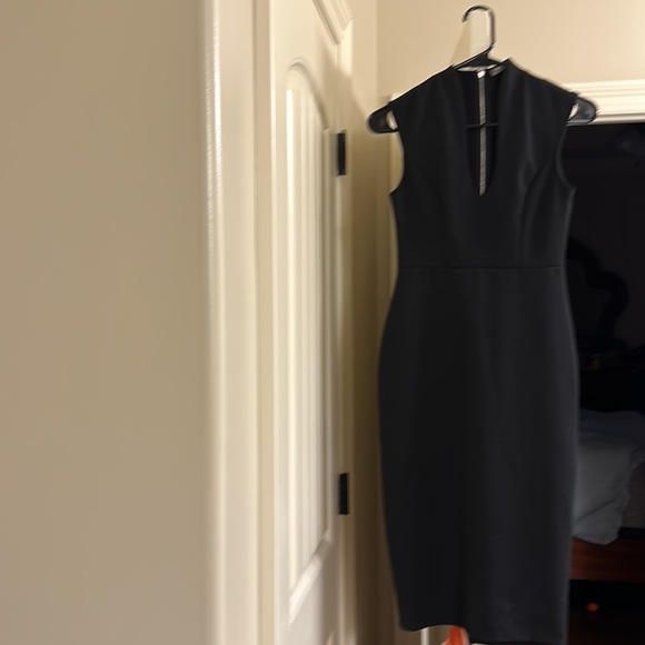 Black elegant tight fitting dress shows off your lovely curves must I say more!l - Picture 6 of 7